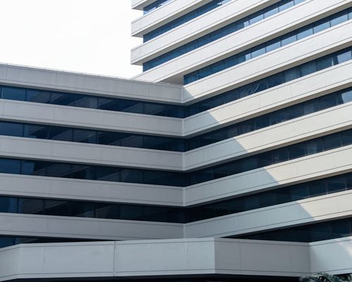 Minimal clean architectural details of an office building exterior in Jakarta